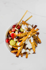 Crispy Greek-style Idaho® Potato Fries with Greek Salad and Tzatziki Sauce