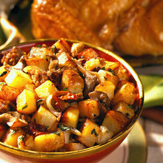 Lemon-Sage Roast Chicken with Sausage-Mushroom-Idaho® Potato Stuffing 