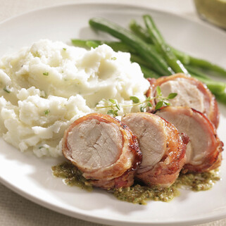Bacon-Wrapped Turkey with Green Chili-Almond Sauce with Idaho® Mashed Potatoes (Chive, Cheddar, or Roasted Garlic Variations)