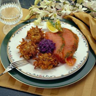 Dill Cured Salmon Graviax with Caraway Idaho® Potato Cakes, Pickled Red Cabbage & Horseradish Ver Jus