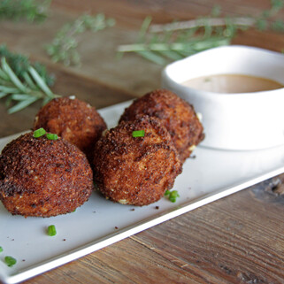 Mashed-Up Kimchi Reuben Tater Bombs with Sweet Onion & Gochujang Aioli