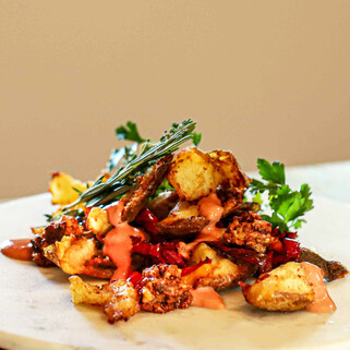 Torn Idaho® Russet Potato Papas Bravas