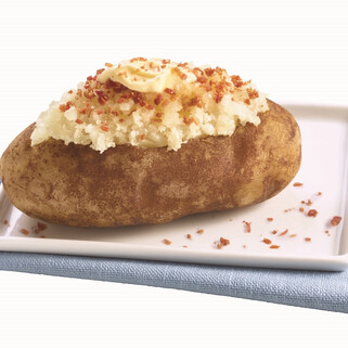 The Ultimate Baked Potato With Butter and Bacon Toppings