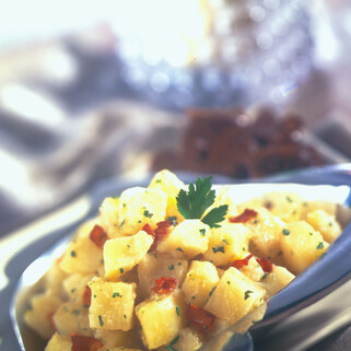 Warm Idaho® Potato Salad Served with Barbecue Short Ribs 