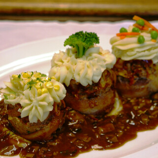 Meatloaf Cupcakes with Idaho®Potato "Frosting" & Wild Mushroom Sauce