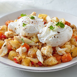 Idaho® Potato and Crab Hash with Poached Eggs