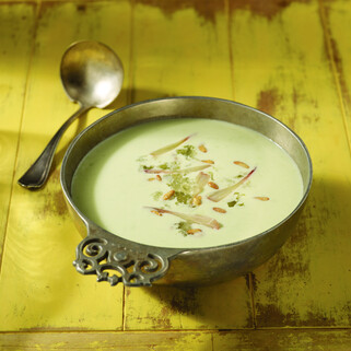 Potato and Ramp Green Soup with Candied Pine Nuts and Creme Fraiche
