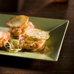 Two Bite Gingery Salmon Potato Burgers on Idaho® Potato Crisps 
