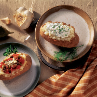Baked Idaho® Potato with Herbed Cottage Cheese and Baked Idaho® Potato with Eggplant Parmigiana Topping