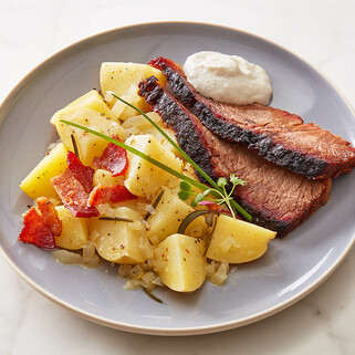 Warm German Idaho® Potato Salad with Smoked Brisket