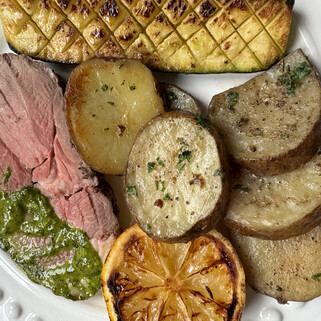 Roasted Boneless Leg of Lamb with Lemon Herbed Idaho Potatoes and Zucchini