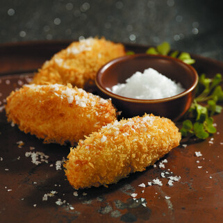 Crispy Yukon Potato "Truffles" with Truffle Cheese