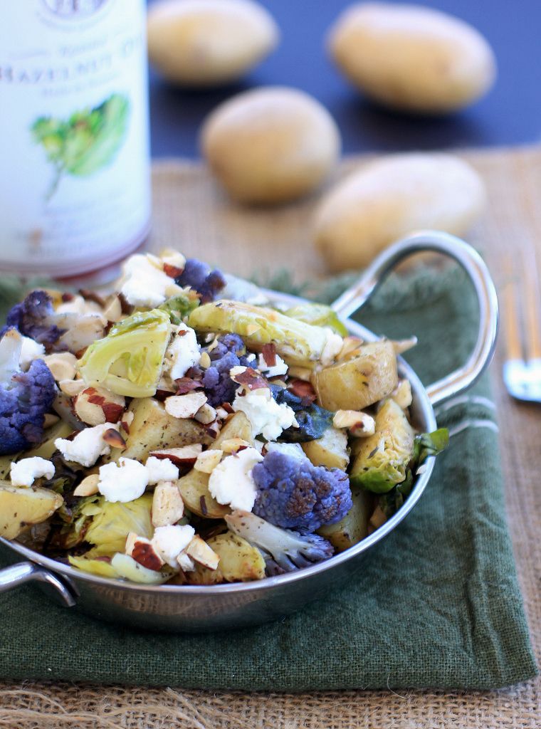 Roasted Idaho&reg; Potatoes, Cauliflower, and Brussels Sprouts with Goat Cheese and Hazelnuts